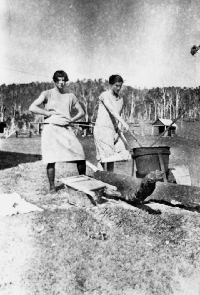Two young women on wash day, Queensland, c1925.  http://commons.wikimedia.org/wiki/File:StateLibQld_1_126875_Grace_and_Annie_boiling_clothes_washing_copper.jpg 