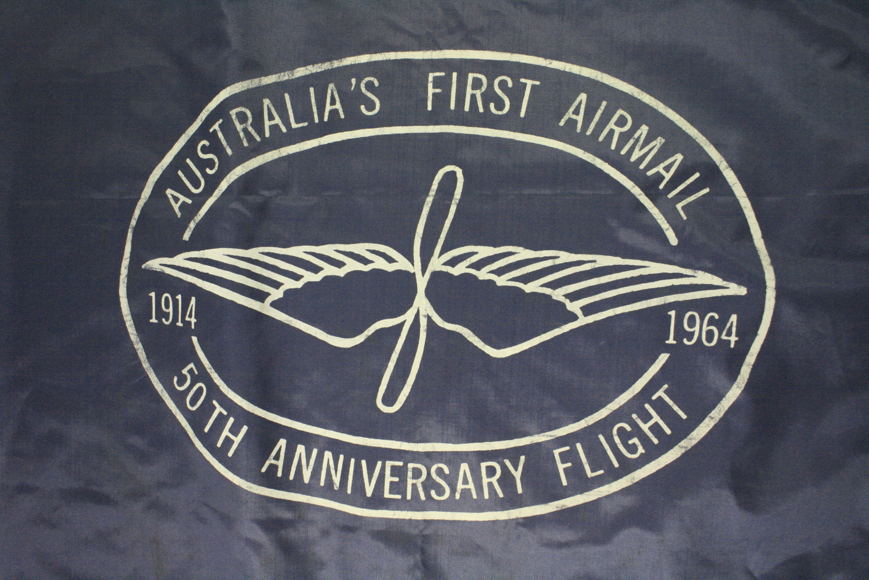 Detail of commemorative airmail bag, celebrating the 50th Anniversary of Australia's First Airmail, 1964. Australia Post Historical Collection, National Museum of Australia.