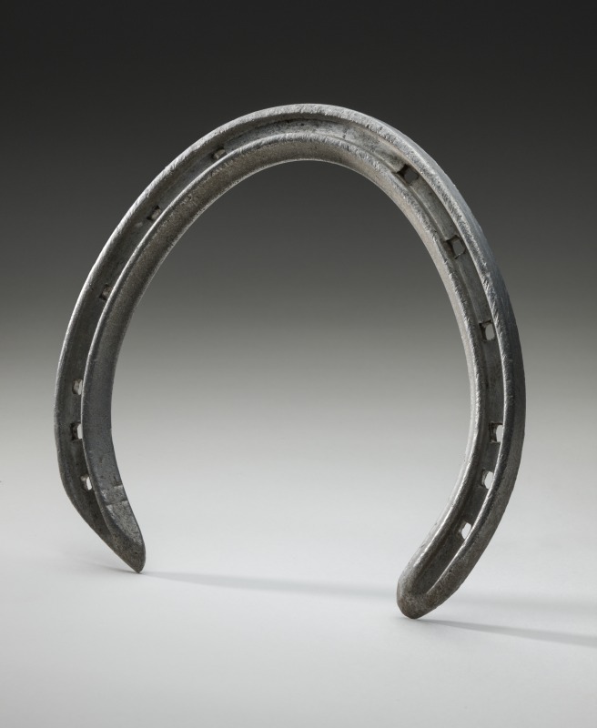 Rising Fast's horseshoe, worn in the 1954 Melbourne Cup. National Museum of Australia.